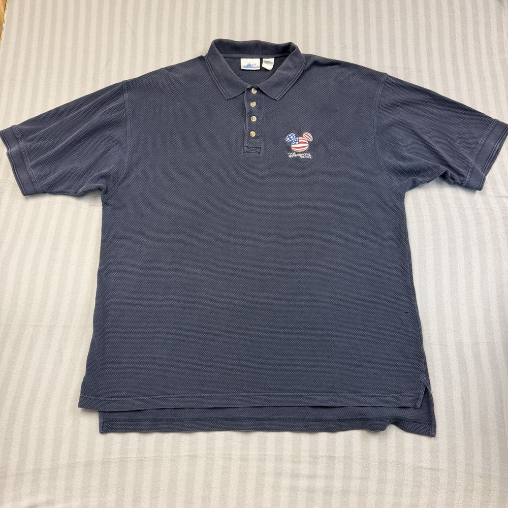 Disneyland Resort Adventure Blue Polo Shirt size XXL‎ Small Hole